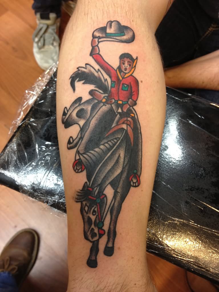 Traditional Cowboy Riding Horse Tattoo On Forearm