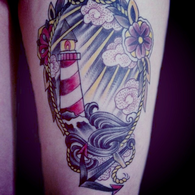Traditional Flowers And Lighthouse Tattoo On Leg