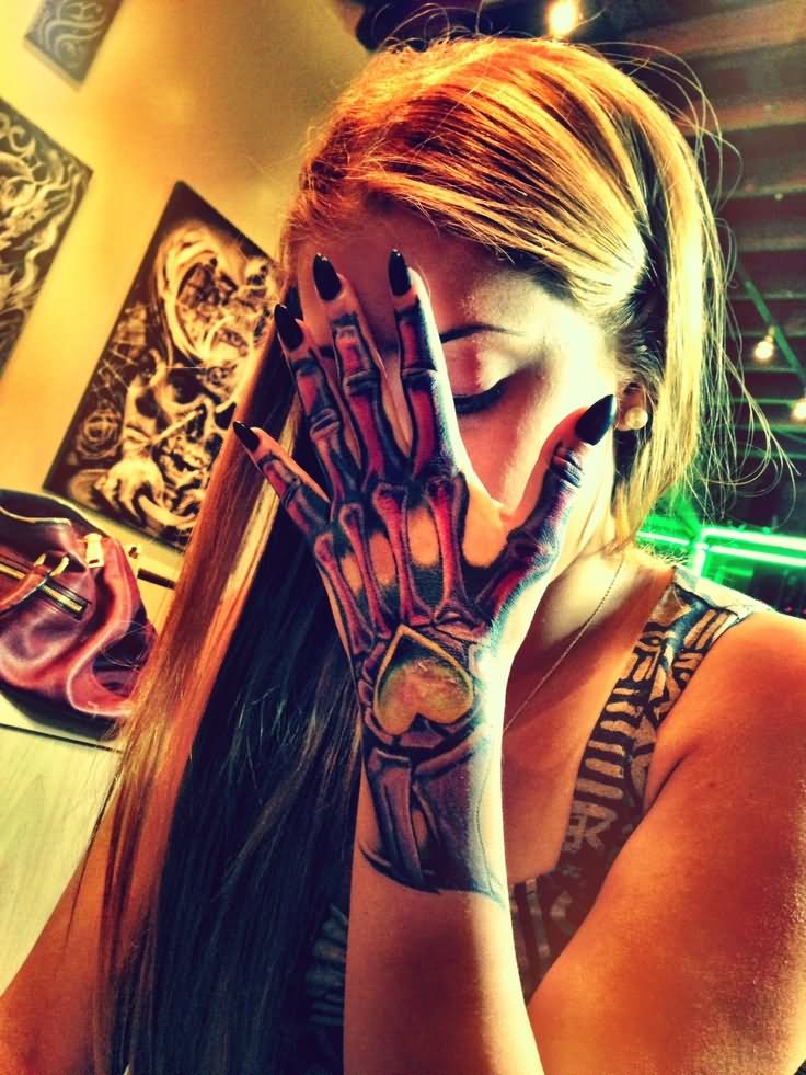 Traditional Hand Bone Tattoo On Girl Left Hand