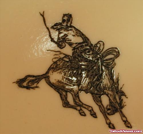 Unique Cowboy Horse Tattoo Design