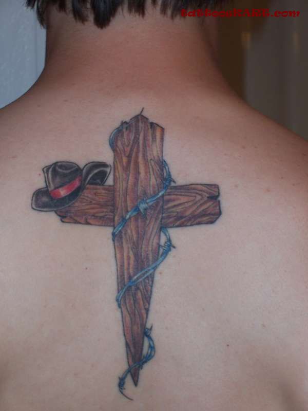 Wooden Cross With Cowboy Hat Tattoo On Upper Back
