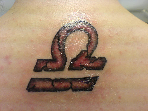Zodiac Sign Libra Tattoo On Upper Back