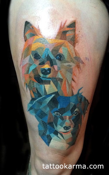Abstract Two Dog Face Tattoo On Thigh