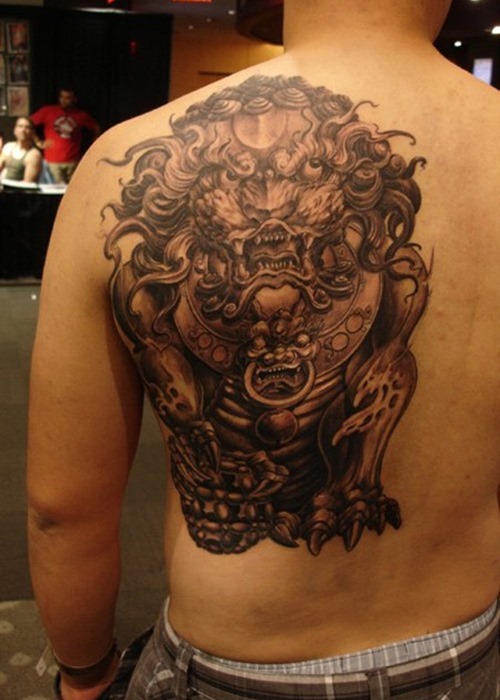 Amazing Foo Dog Tattoo On Man Full Back