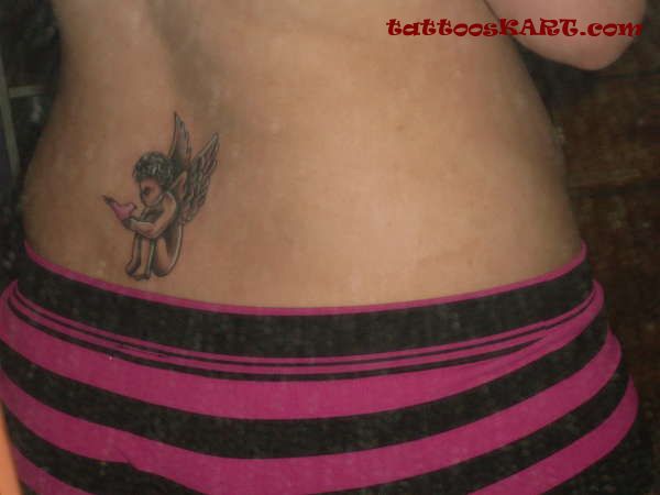 Awesome Black Ink Cupid Cherub Tattoo On Lower Back
