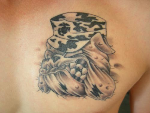 Black And Grey Bulldog Face Tattoo On Man Chest