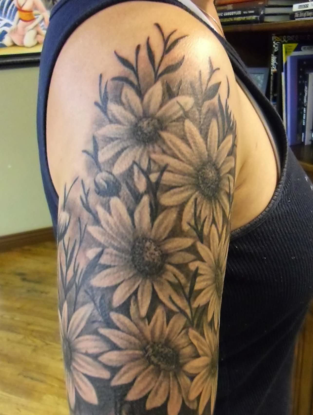 Black And Grey Daisy Flowers Tattoo On Right Shoulder