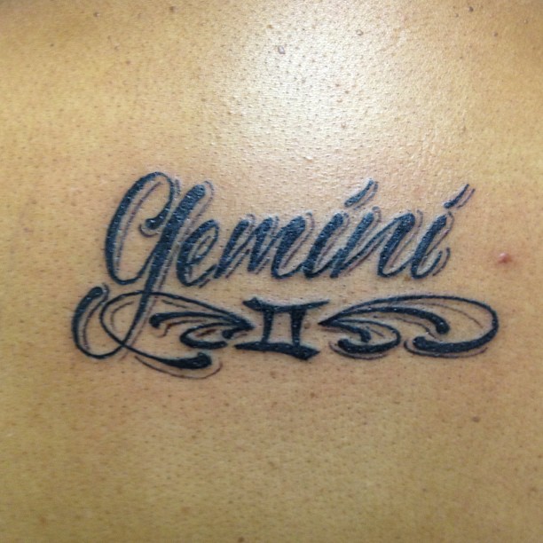 Black And Grey Gemini Zodiac Sun Sign Tattoo