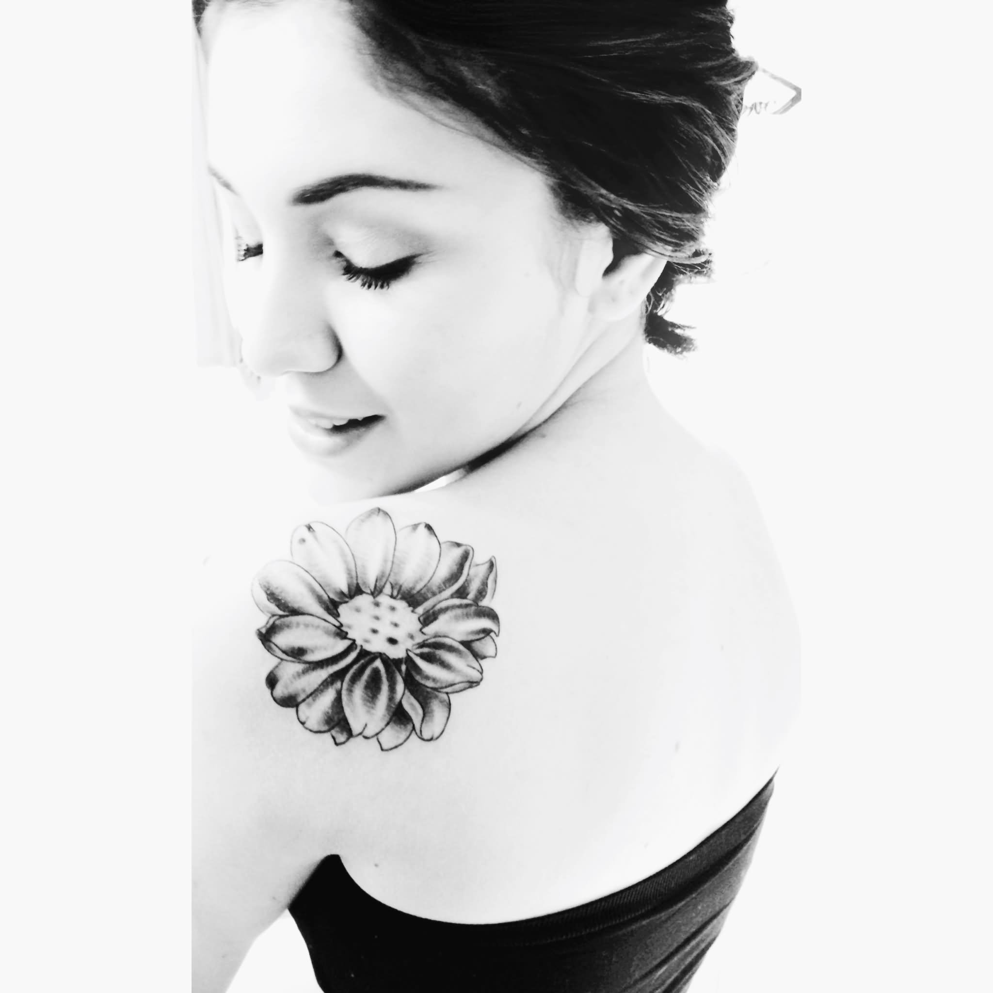 Black And White Daisy Flower Tattoo On Girl Left Back Shoulder