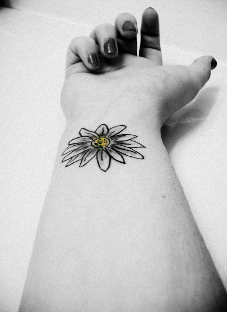 Black And White Daisy Tattoo On Girl Wrist