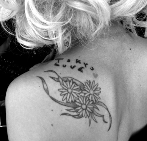 Black And White Three Daisy Flowers Tattoo On Girl Left Back Shoulder
