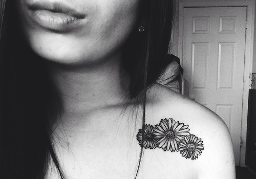 Black And White Three Daisy Tattoo On Girl Left Front Shoulder