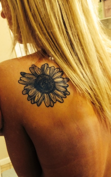 Black Daisy Flower Tattoo On Girl Left Back Shoulder