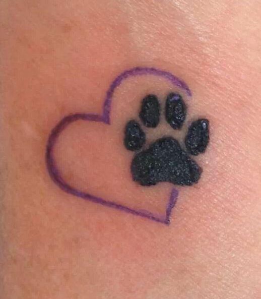 Black Dog Paw Print In Heart Tattoo Design