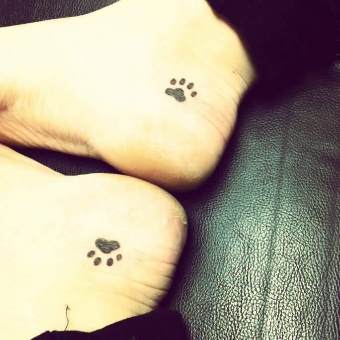 Black Dog Paw Print Tattoo On Heel
