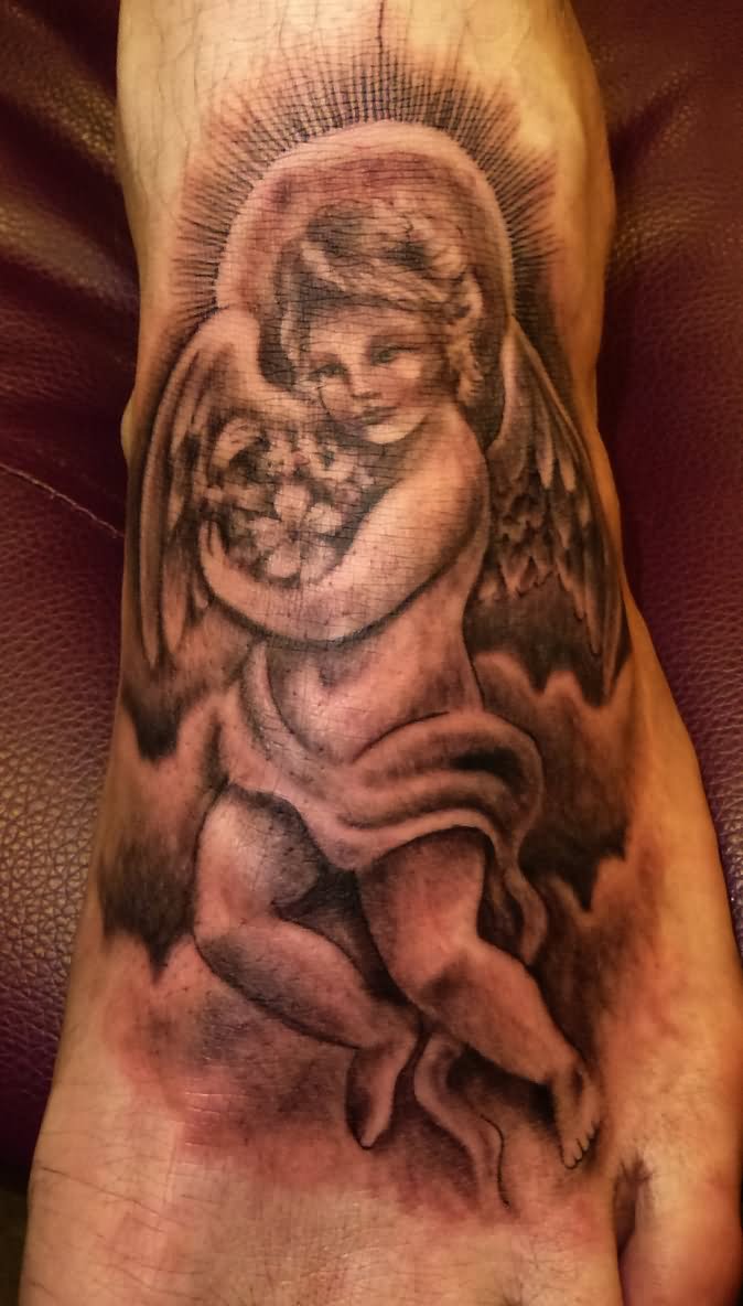 Black Ink Cupid Cherub Tattoo On Foot