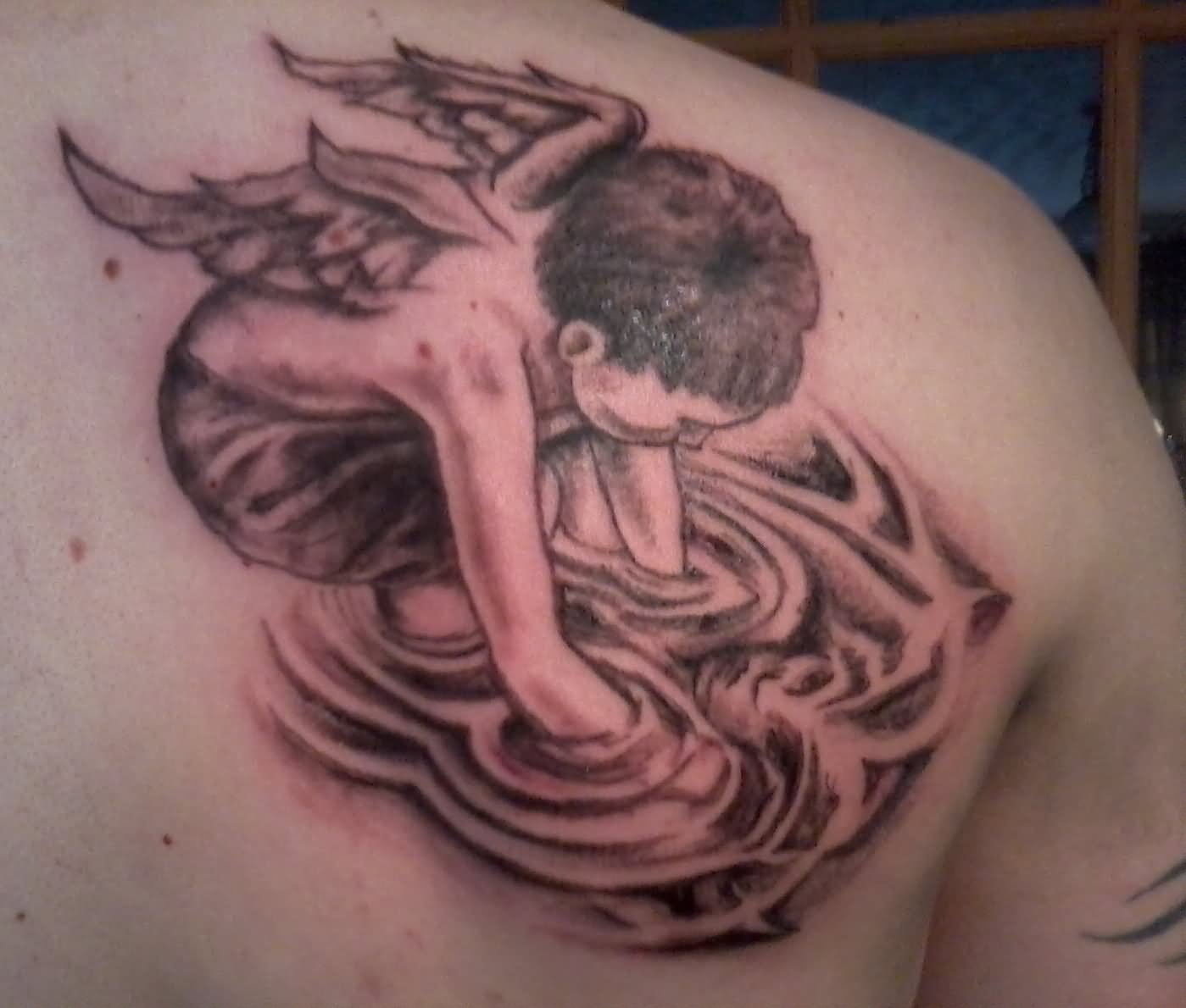Black Ink Cupid Cherub Tattoo On Right Back Shoulder
