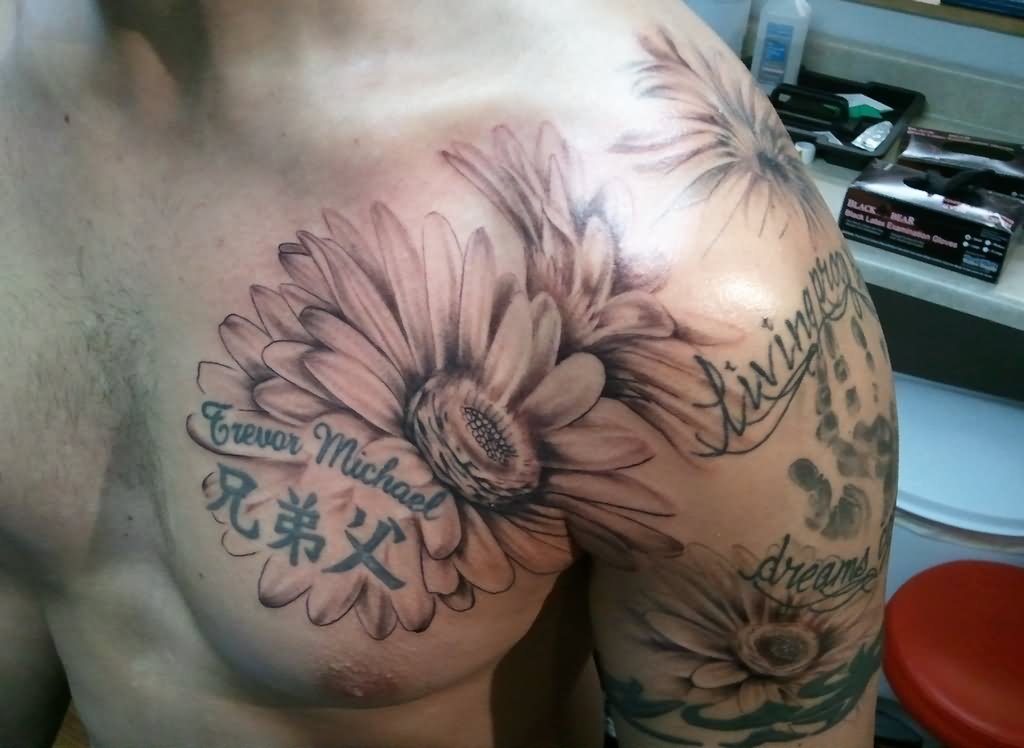 Black Ink Daisy Flowers Tattoo On Man Left Front Shoulder