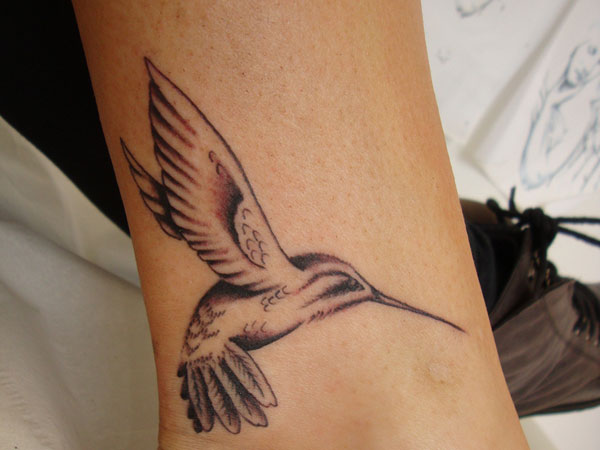 Black Ink Flying Hummingbird Tattoo Design For Leg
