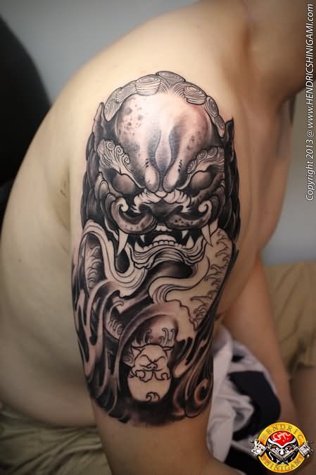 Black Ink Foo Dog Tattoo On Man Right Half Sleeve