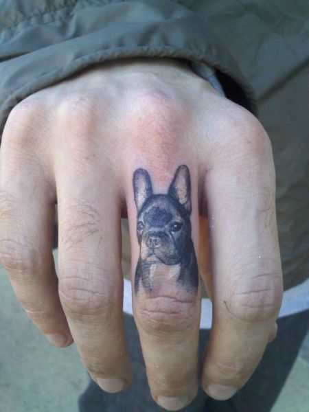 Black Ink French Bulldog Tattoo On Finger