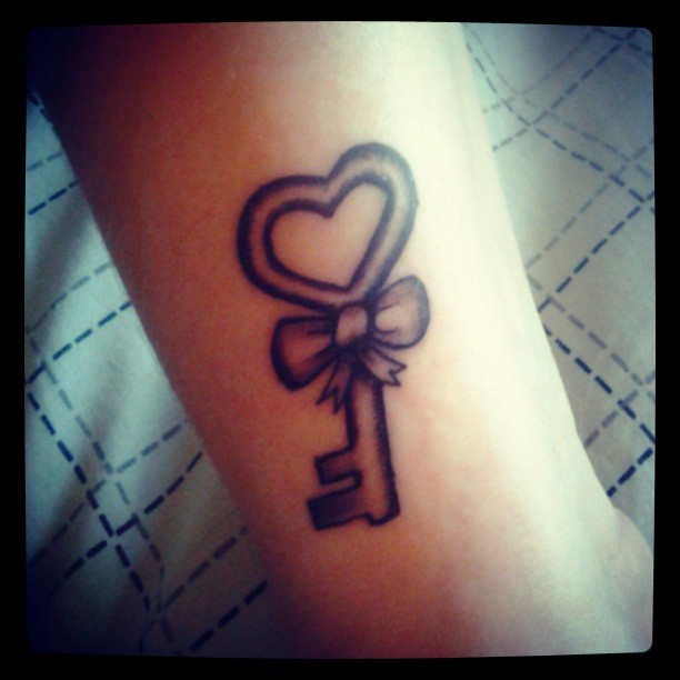 Black Ink Heart Key Tattoo Design For Forearm