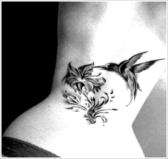 Black Ink Hummingbird With Flowers Tattoo On Side Neck