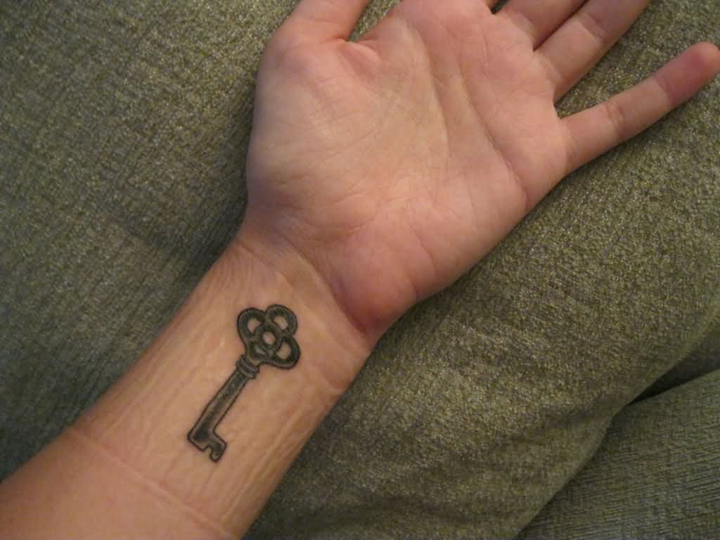 Black Ink Key Tattoo On Wrist