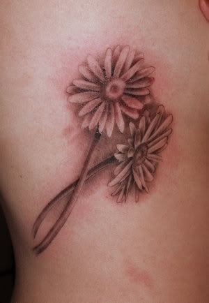 Black Ink Two Daisy Flowers Tattoo On Side Rib