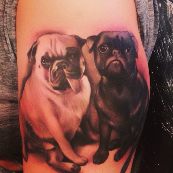 Black Ink Two Pug Dogs Tattoo Design For Half Sleeve