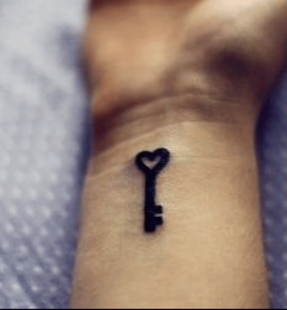 Black Little Heart Key Tattoo Design For Wrist