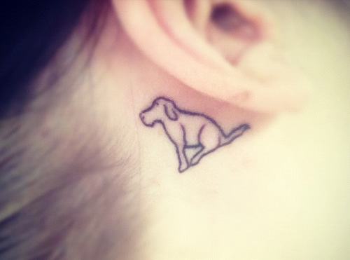 Black Outline Dog Tattoo On Girl Behind The Ear