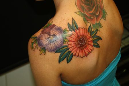Colorful Daisy And Rose Tattoo On Girl Left Back Shoulder