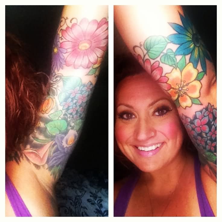 Colorful Daisy Flowers Tattoo On Girl Left Half Sleeve