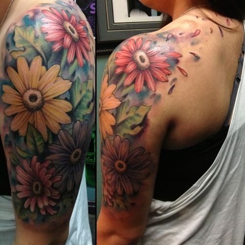 Colorful Daisy Flowers Tattoo On Left Half Sleeve
