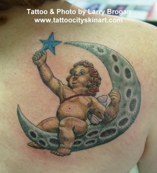 Cupid Cherub On Half Moon Tattoo On Right Back Shoulder