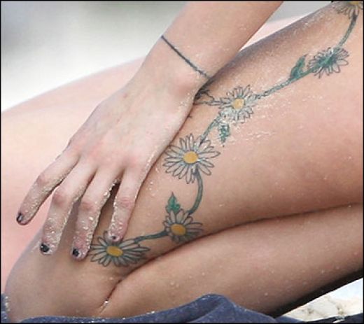 Daisy Flowers Tattoo On Girl Thigh