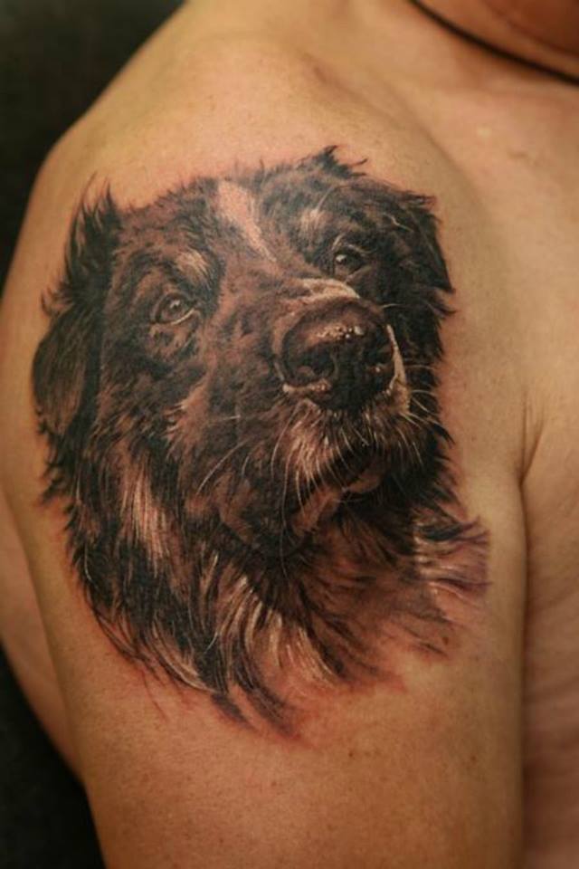 Fantastic Black Ink Dog Face Tattoo On Right Shoulder