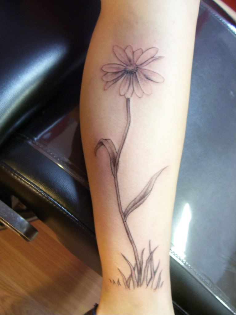 Fantastic Daisy Flower Tattoo Design For Forearm
