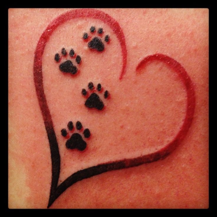 Four Dog Paw Print In Heart Tattoo Design