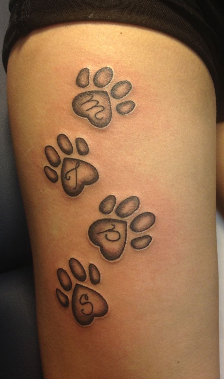 Four Dog Paw Print Tattoo Design For Half Sleeve