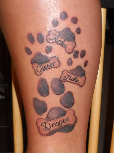 Four Dog Paw Print With Bone Tattoo Design For Leg