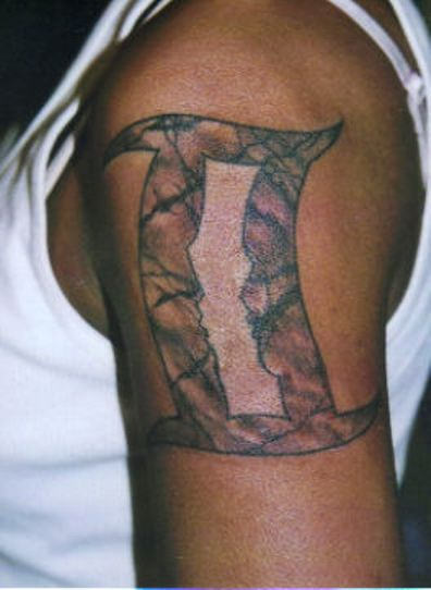 Gemini Zodiac Symbol Tattoo On Left Shoulder
