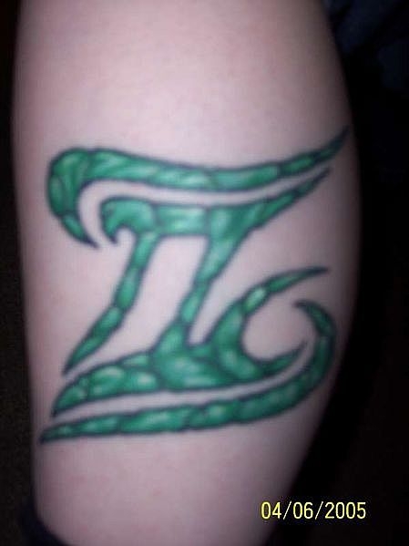 Green Gemini Tattoo On Leg