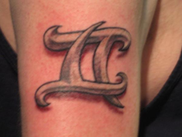 Grey Ink Gemini Zodiac Sign Tattoo