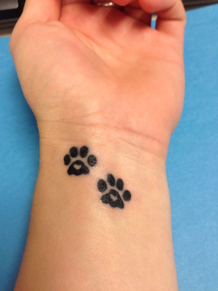 Heart In Two Dog Paw Print Tattoo On Wrist