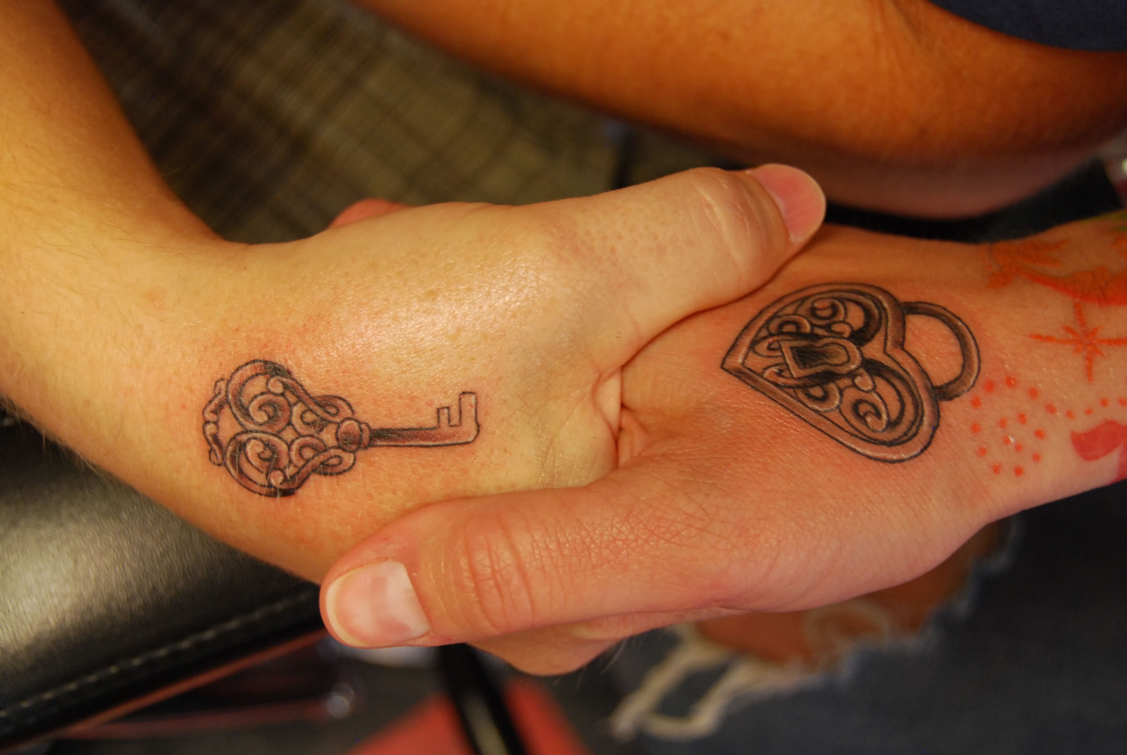 Heart Lock And Key Tattoo On Couple Hand