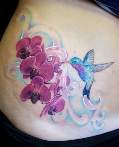 Hummingbird With Flowers Tattoo Design For Side Rib