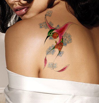 Impressive Flying Hummingbird Tattoo On Girl Left Back Shoulder
