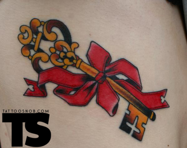 Key With Red Ribbon Tattoo Design
